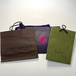 Louis Vuitton shopping bag and Gucci, Tori Burch designer carrier bags
